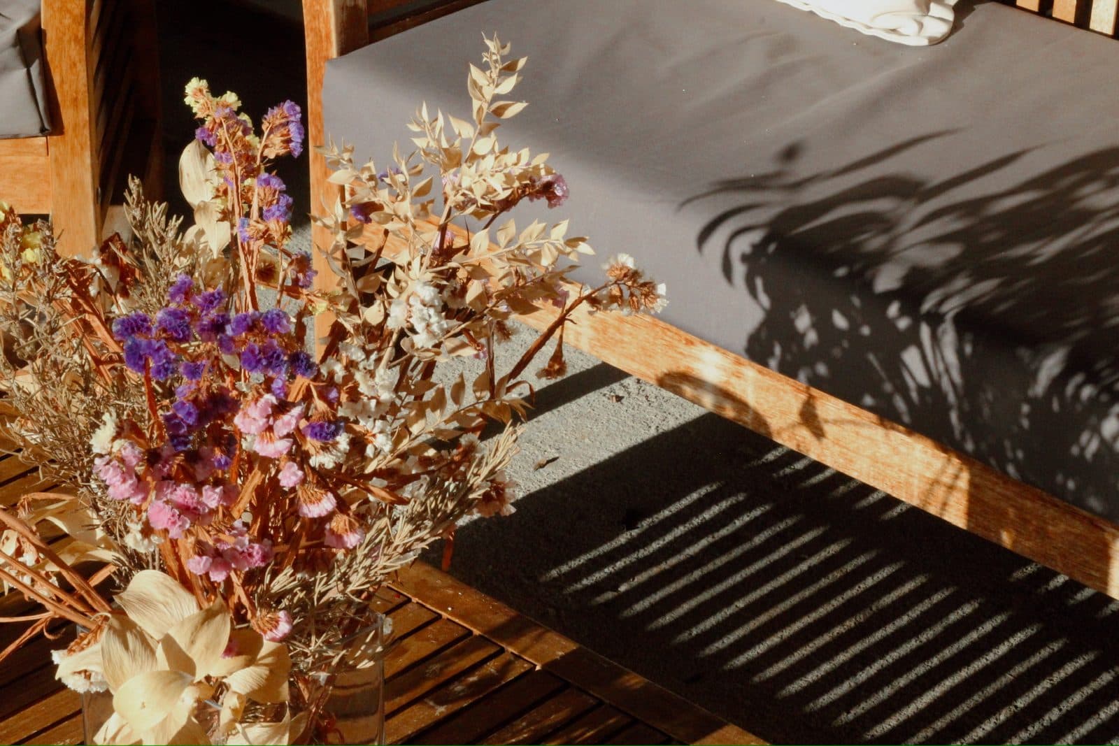 Seasonal flowers in dappled light