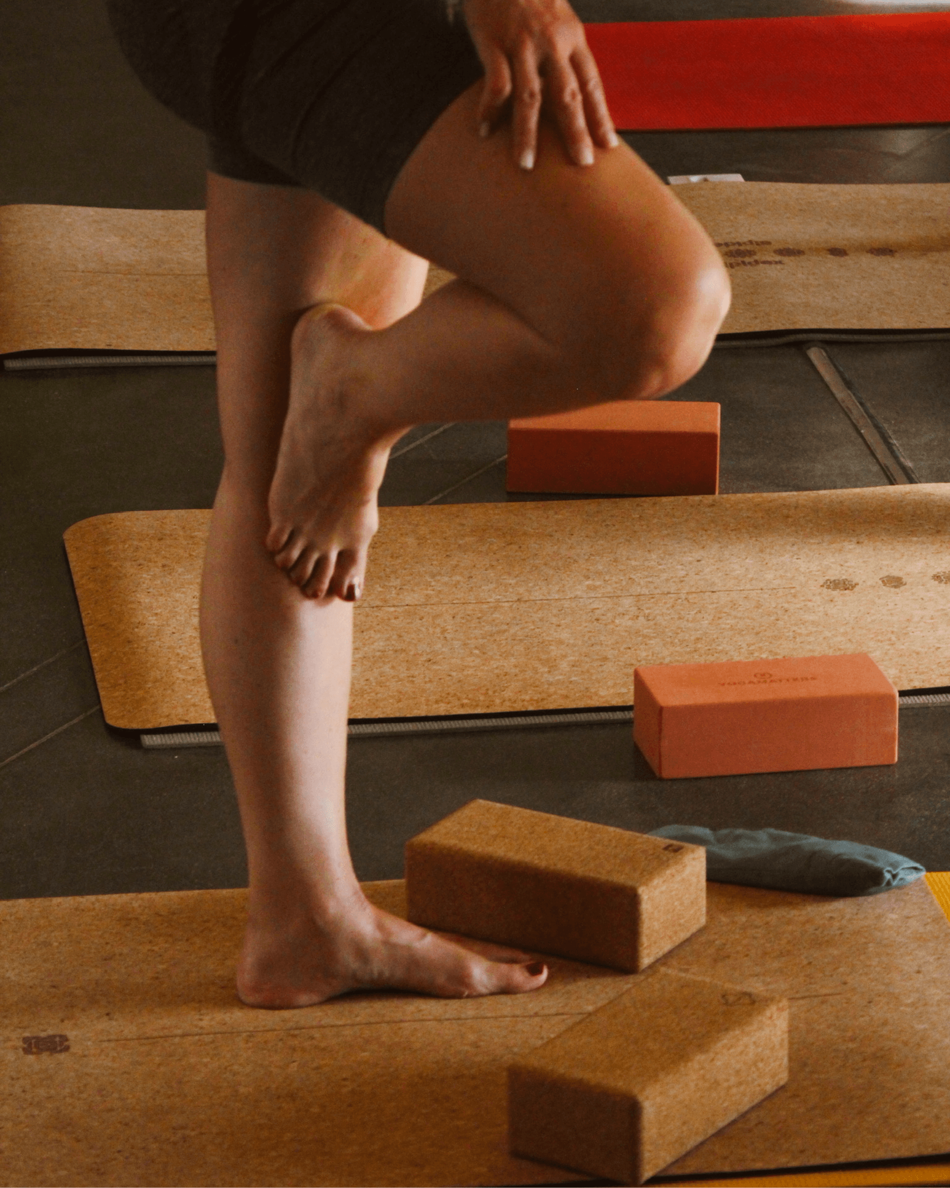 Standing balance pose on a cork yoga mat