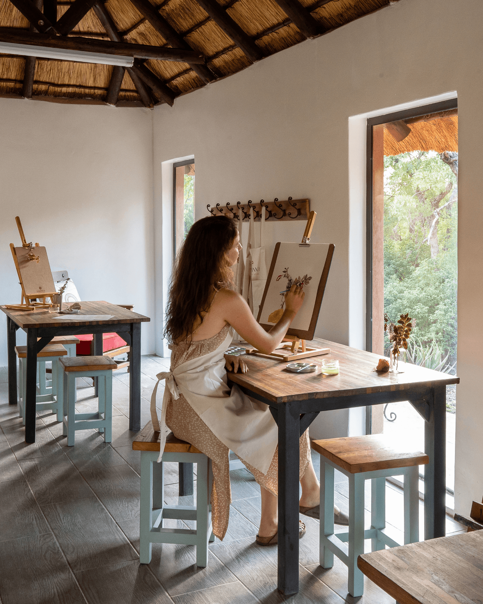 Lady painting in a creative art studio